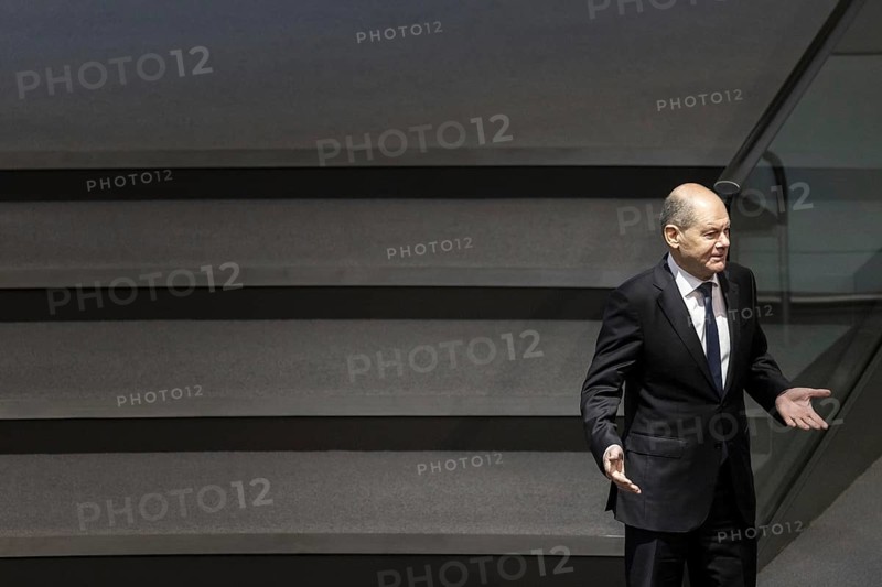 Olaf Scholz (SPD), Federal Chancellor, arrives in the plenary chamber of the German Bundestag in Berlin. Among other things, the 2024 federal budget will be discussed today. 30.01.2024