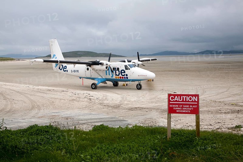 Flybe plane on sandy airstrip Isle of Barra airport, Barra, Outer Hebrides, Scotland, UK