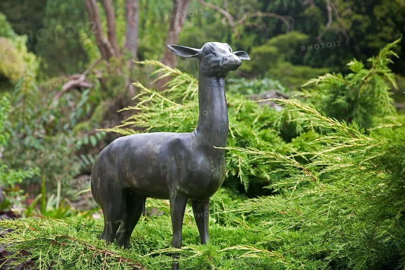 Bronze deer sculpture in Italianate garden of landscape gardener Harold Ainsworth Peto created between 1899 and 1933, at Iford Manor, near Freshford, Wiltshire, England, UK