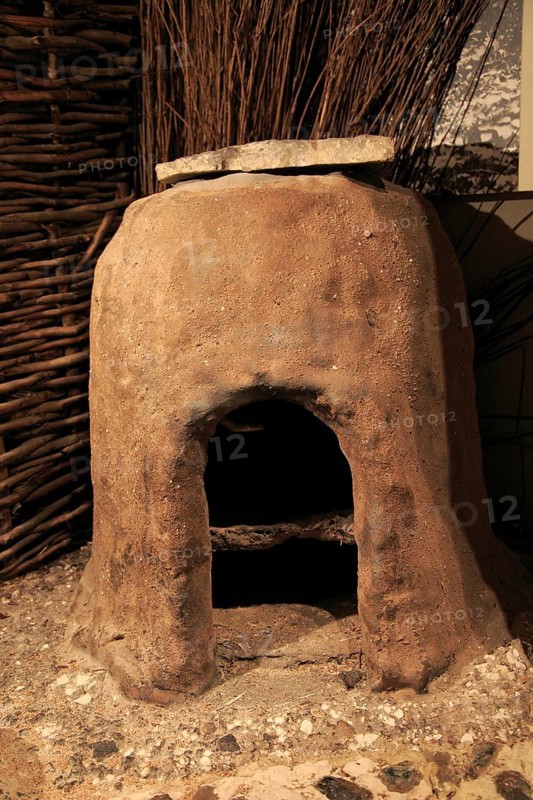 Bread oven in Iron Age museum, Andover, Hampshire, England, UK