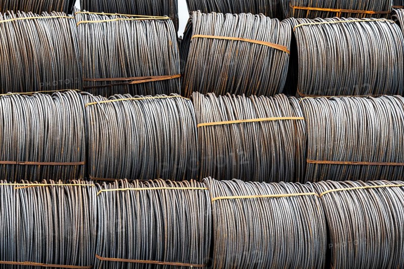 Steel wire, coils, waiting for further processing in the Rhine-Ruhr harbour in Mülheim an der Ruhr, North Rhine-Westphalia, Germany, Europe