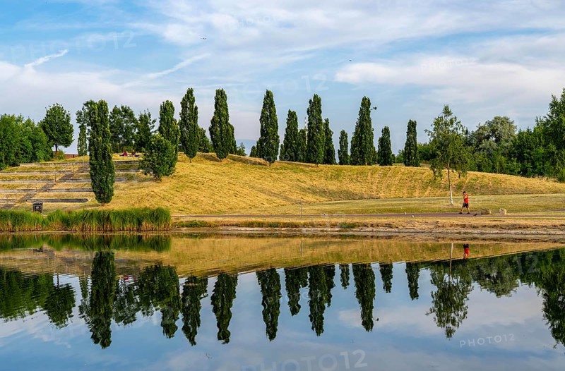 The Krupp Park in Essen-Altendorf, part of the Krupp Belt, an urban development project to rebuild the former Krupp industrial quarter in the west of Essen, 230 hectares of newly designed parkland on 5 hills, with a rainwater-fed lake, sports facilities, playgrounds, North Rhine-Westphalia, Germany, Europe