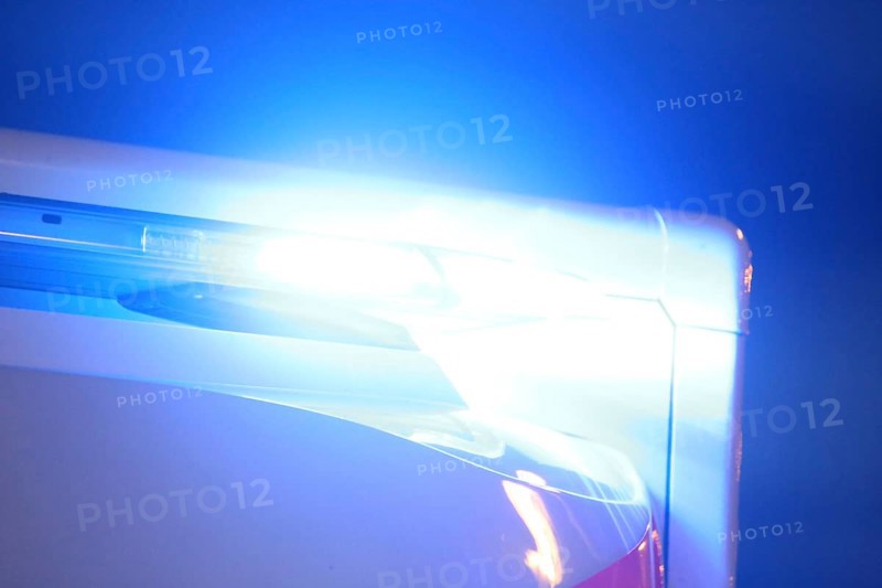 Close-up of a blue light on an ambulance at night (Berlin)