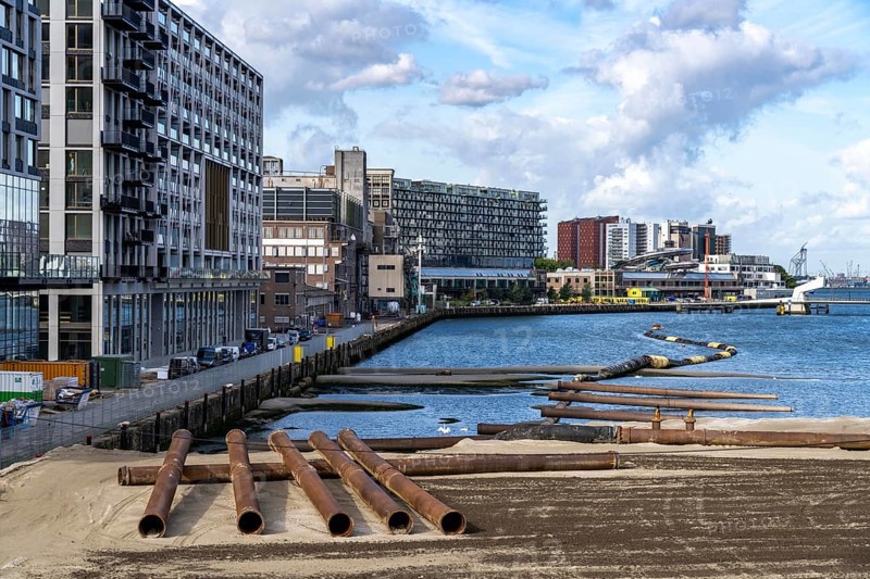 The Rijnhaven, a 28-hectare harbour basin, has now been filled in by almost a third to create space for up to 3, 000 flats, there will be an artificial beach, a floating park connected by jetties, restaurants and shops, cultural facilities, a major urban development project in the old harbour, the Rijnhaven borders on the popular Kop van Zuid and Katendrecht districts, Rotterdam, Netherlands
