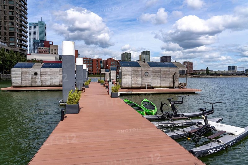 Floating hotel rooms, Wikkelboat in the Rijnhaven, the Rijnhaven, a 28-hectare harbour basin, has now been filled in by almost a third to create space for up to 3, 000 flats, there will be an artificial beach, a floating park connected by jetties, restaurants and shops, cultural facilities, a major urban development project in the old harbour, the Rijnhaven borders on the popular Kop van Zuid and Katendrecht districts, Rotterdam, Netherlands