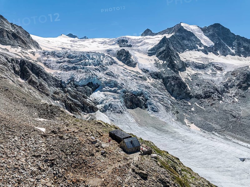 Mountain hut Cabane de Moiry, located close to the retreating Moiry glacier, aerial view, Valais, Switzerland, Europe