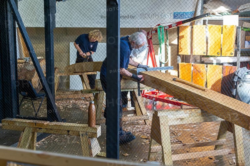 Craftsmen working on reconstruction of Anglo-Saxon ship from Sutton Hoo, Longshed building, Woodbridge, Suffolk, England, UK