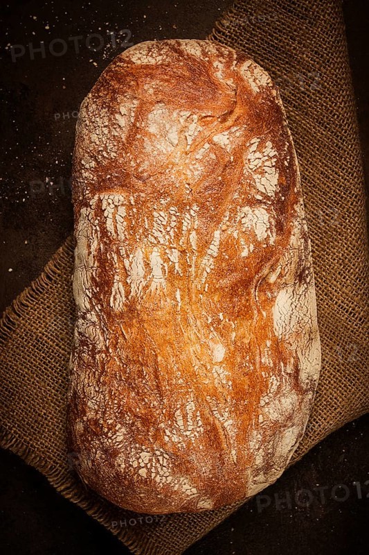Fresh whole grain bread, rye, top view, without people