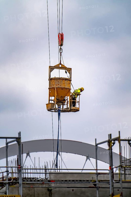 Concreting work on a construction site, new construction of a high-rise office building, facade of the shell, scaffolding, Cologne, North Rhine-Westphalia, Germany, Europe