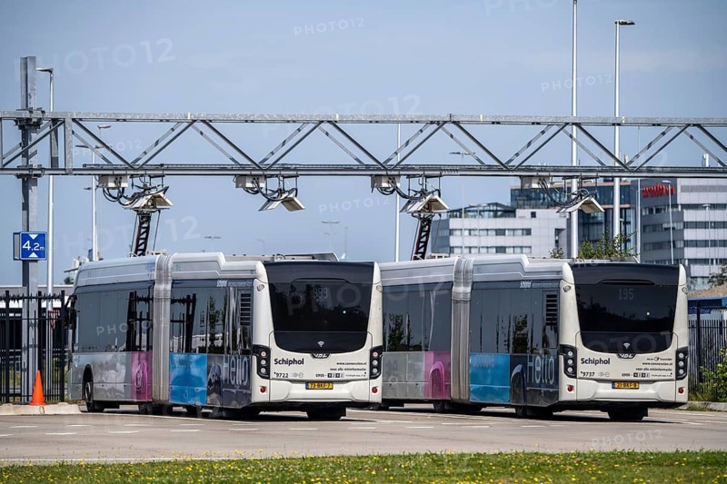 Fast charging station for electric buses at Amsterdam Schiphol Airport, the entire fleet of passenger transport buses is electric, over 200 vehicles, during breaks the buses are recharged via a roof-mounted pantograph, vehicles of the transport company Connexxion, Netherlands