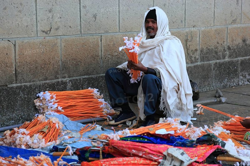 Europia district, Debre Lebanon, Lipanus monastery, man sorting wax torches for the pilgrims at the monastery, Ethiopia, Africa