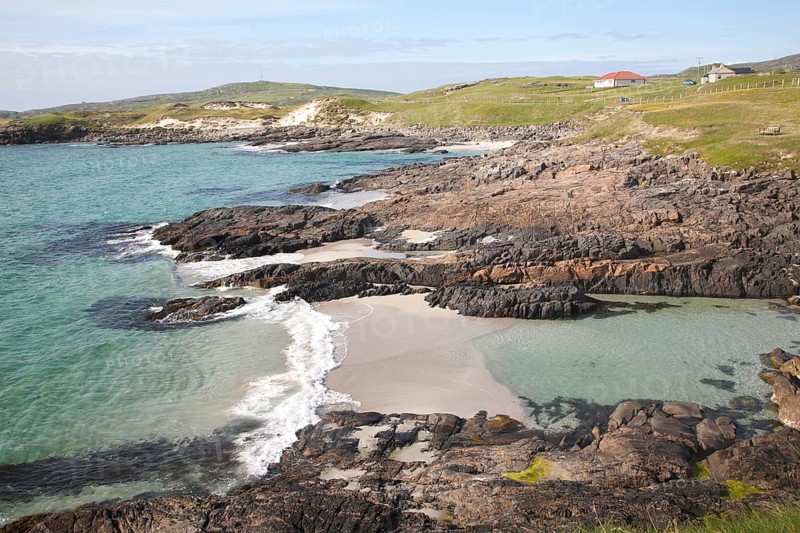 Atlantic coastline rocky headlands and small sandy bays near Borgh, Barra, Outer Hebrides, Scotland, UK