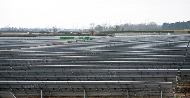Solar array of photovoltaic panels in a large new solar park at Bucklesham, Suffolk, England, United Kingdom, Europe