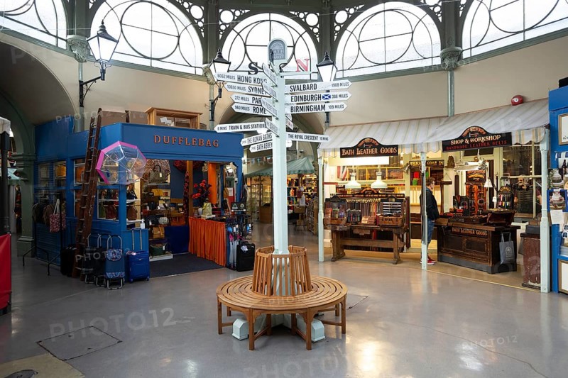 Mile marker of distances to destinations inside Guildhall market, Bath, Somerset, England, UK