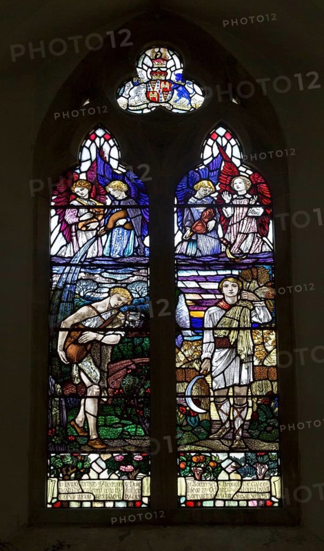 Village parish church of All Saints, Maiden Bradley, Somerset, England, UK stained glass memorial window