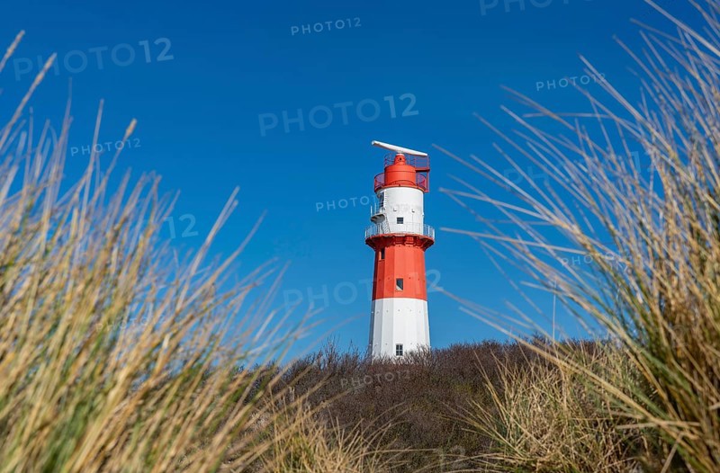 Small Borkum lighthouse, out of service since 2003, still serves as an antenna support for the Ems traffic safety system, North Sea island of Borkum, Lower Saxony, Germany, Europe