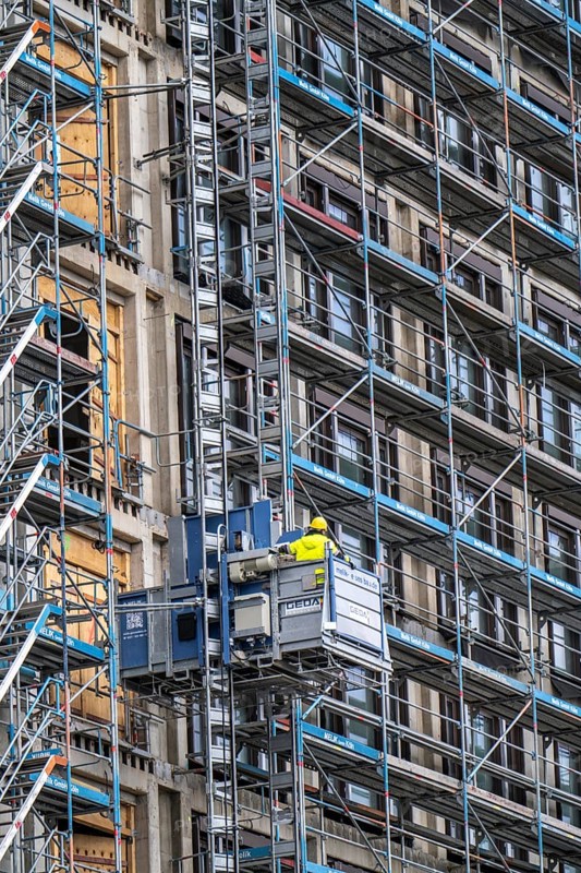 Construction site, construction site lift, new construction of a high-rise office building, facade of the shell, scaffolding, Cologne, North Rhine-Westphalia, Germany, Europe