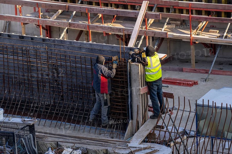 Construction site, reinforced concrete reinforcement bars, motorway construction site, part of a tunnel wall being assembled