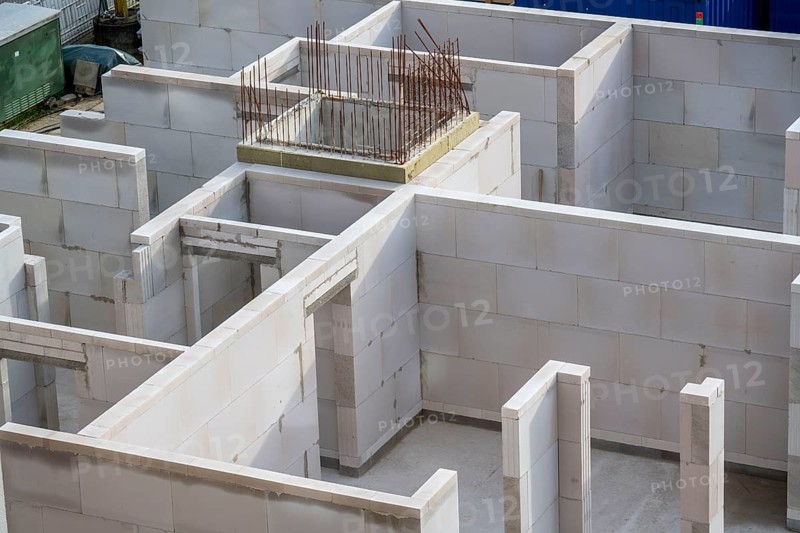 Building site, shell construction, walls of a residential building are finished, lift shaft