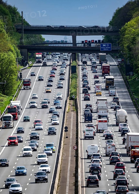 The A3 motorway, heavy traffic on 8 lanes, including the temporarily open hard shoulder, in front of the Hilden motorway junction, looking south, near Erkrath, North Rhine-Westphalia, Germany, Europe