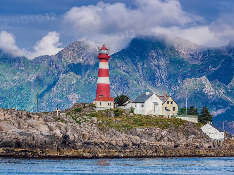 Lighthouse on island Skrova, rocky small island, view towards Lofoten islands, Norway, Europe