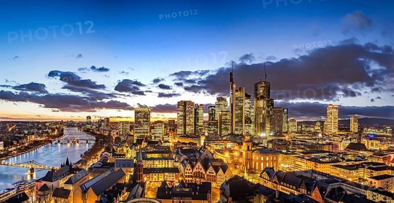 View of the banking district in the evening, skyscrapers of the credit institutions, Mainhatten, in front of it the historic old town with Römer and Paulskirche, Frankfurt am Main, Hesse, Germany, Europe