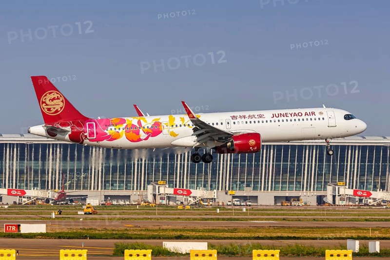 An Airbus A321neo aircraft of Juneyao Air with the registration number B-30EQ at Pudong Airport (PVG) in Shanghai, China, Asia