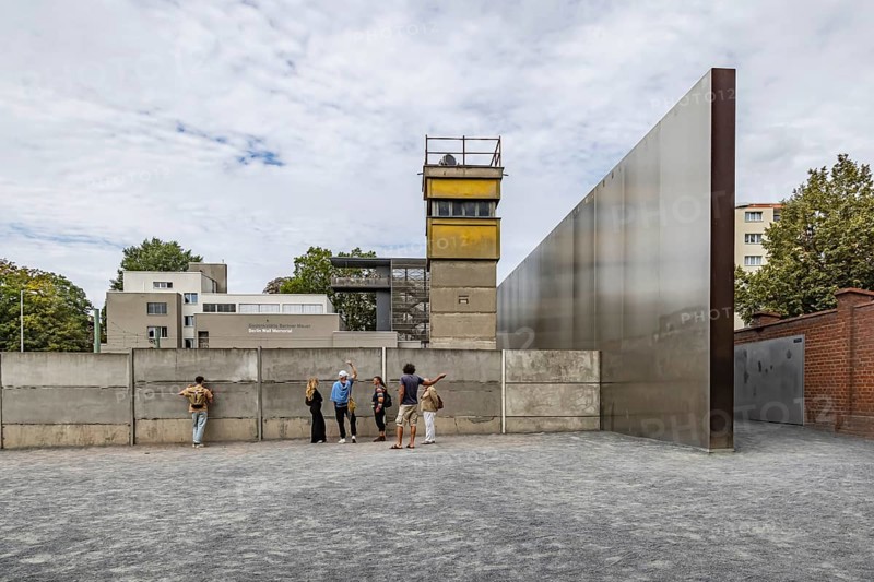 Berlin Wall Memorial, sight and reminder of the division by the Berlin Wall and of the fatalities at the border. Original preserved border strip with watchtower on Bernauer Strasse, Berlin, Germany, Europe