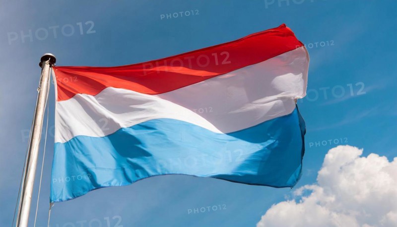 Flags, the national flag of Luxembourg flutters in the wind