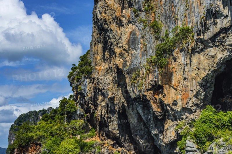 Chalk cliffs near Krabi, weather, sky, climbing rocks, climbing, mountain, hill, mountainous, rainforest, nature, island, travel, tourism, climate, tropical, season, holiday, exotic, sun, sunny, blue sky, travel photo, rock, rocky, sandstone cliffs, coast, coastal landscape, landscape, nature, natural landscape, Siam, paradise, holiday paradise, limestone cliffs, Railay beach, Phuket, Thailand, Asia