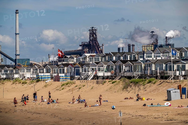 The Tata Steel steel and smelting works in IJmuiden, Velsen, North Holland, Netherlands, largest industrial area in the Netherlands, 2 blast furnaces, 2 coking plants, rolling mills, directly on the North Sea, beach houses near Ijmuiden aan Zee