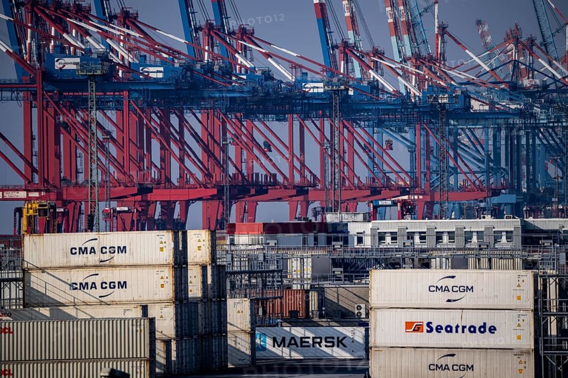 Container terminal in the seaport of Bremerhaven, Eurogate Container Terminal with almost 50 container gantry cranes, cranes, on a length of over 4 KM at the mouth of the Weser, straddle carriers bring the containers to and from the container ships, or store them between, Bremerhaven, Bremen, Germany, Europe