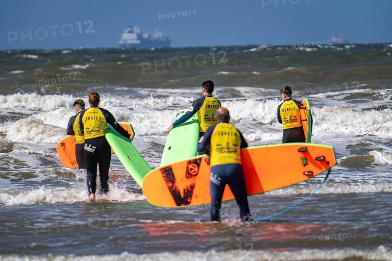 Course for surfers, surfing beginners, on the beach of Scheveningen, Netherlands