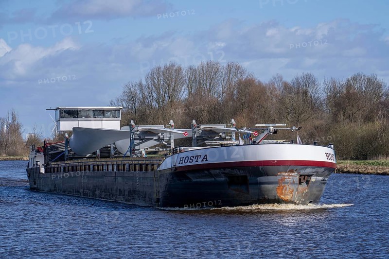 Transport of rotors, blades for wind turbines, by barge on canals in the Netherlands, near Groningen, from the manufacturer to assembly on site, Netherlands