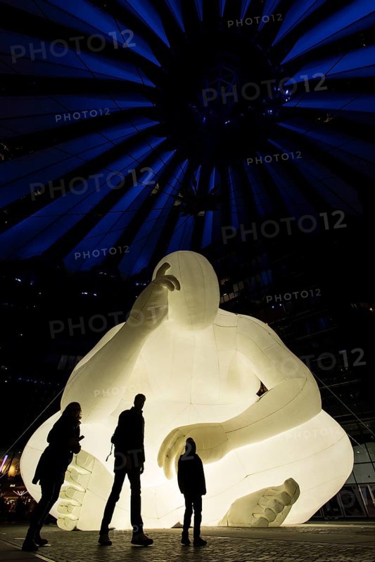 Illuminated Denker statue in the Sony Center at Potsdamer Platz for the Festival of Light, Berlin, 03/10/2024