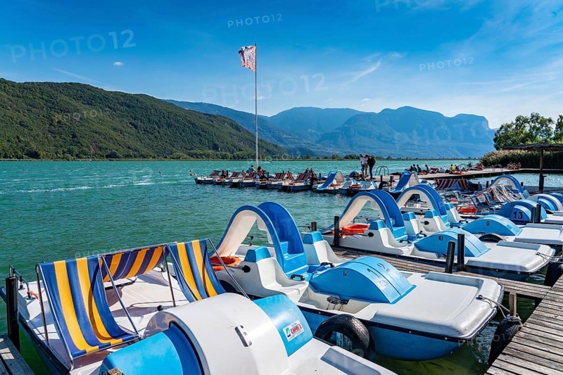 Boat hire, pedal boats, Gretl am See lido on Lake Kaltern, near the village of Kaltern, in the Adige Valley in South Tyrol, one of the two warmest lakes in the Alps, bathing lake, surrounded by vineyards and apple orchards, Italy, Europe
