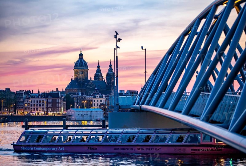 Amsterdam, Netherlands, bridge from the Nemo Science Museum to the city centre, St. Nicholas Basilica