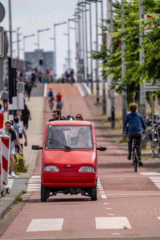 Minicar, model Canta, very small car, up to 45 km/h, may be driven from 15 years of age, may use cycle paths, very popular in Amsterdam because they can find a parking space almost anywhere, Netherlands