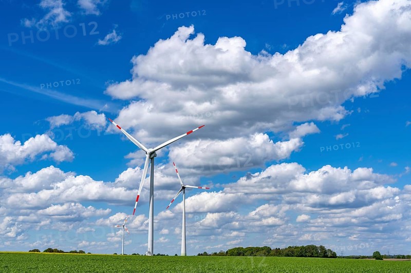 Wind farm, wind turbine, wind turbines from the manufacturer Enercon, blue sky with many white clouds, between Schermbeck and Dorsten, country road, Bestener Straße, North Rhine-Westphalia, Germany, Europe