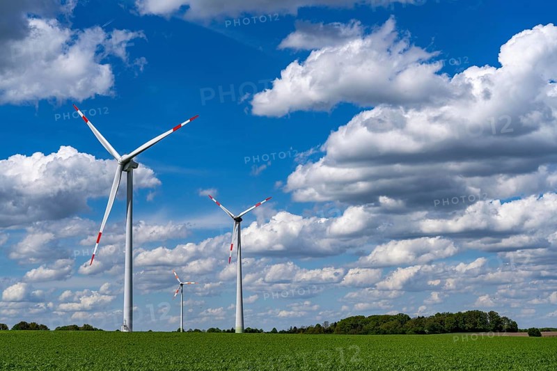 Wind farm, wind turbine, wind turbines from the manufacturer Enercon, blue sky with many white clouds, between Schermbeck and Dorsten, country road, Bestener Straße, North Rhine-Westphalia, Germany, Europe