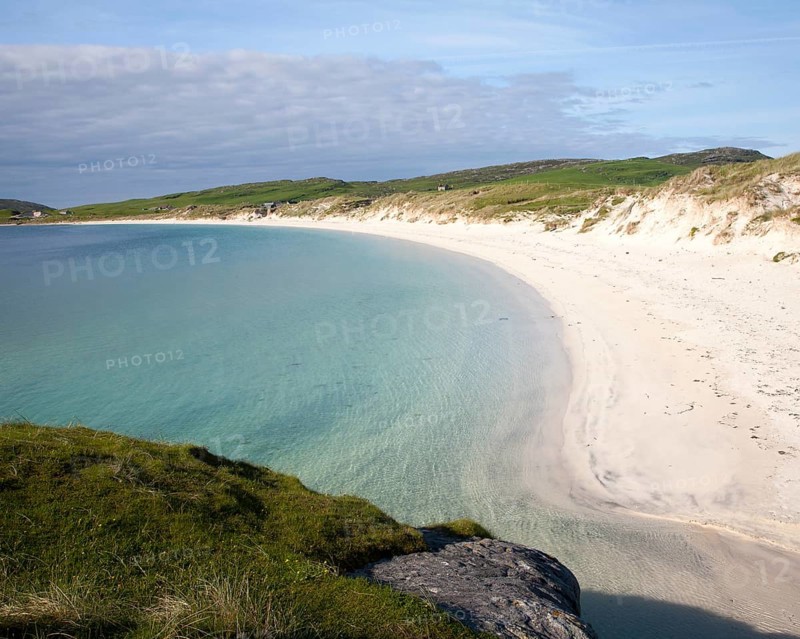 Sandy beach and aquamarine sea at Vatersay Bay, Barra, Outer Hebrides, Scotland, UK