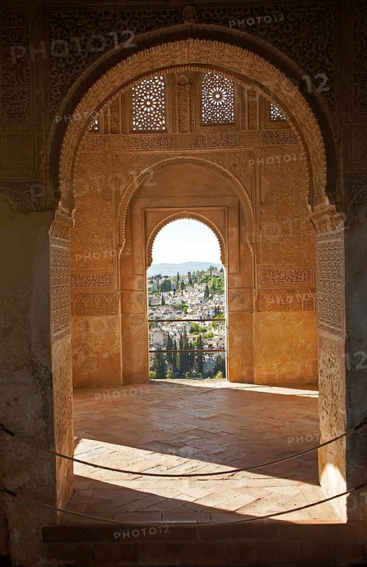 Stone arches in Islamic key shape in the Generalife palace, Alhambra, Granada, Spain, Europe