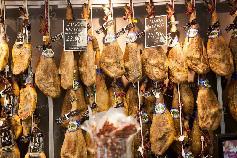 Close up display of cured hams inside a specialist shop in Barrio Macarena, Seville, Spain, Europe