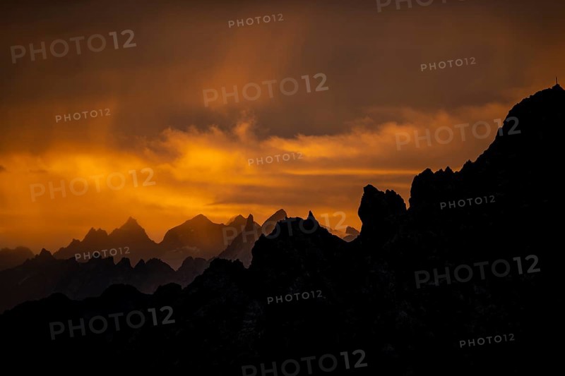 Montafon mountains with dramatic cloudy sky at sunrise, Tschagguns, Rätikon, Montafon, Vorarlberg, Austria, Europe