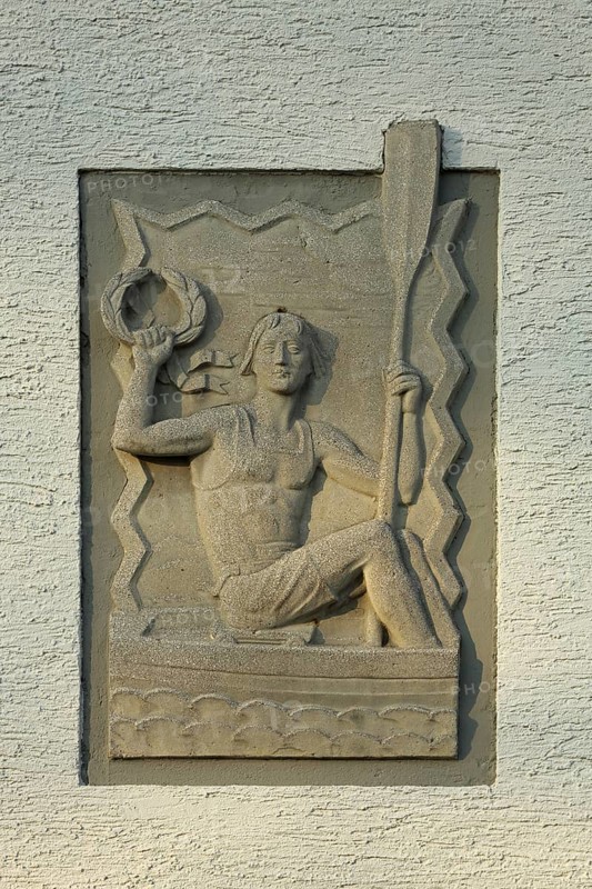 Relief rower with paddle and wreath in boat, rowing, arm, up, hold, sculpture, figure, sport, stone, grey, monochrome, boathouse, Biebrich, Wiesbaden, Taunus, Hesse, Germany, Europe