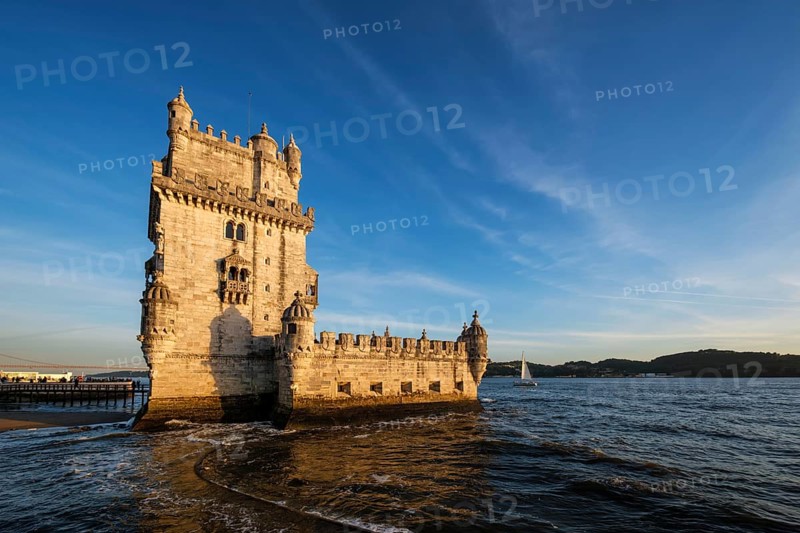 Belem Tower or Tower of St Vincent, famous tourist landmark of Lisboa and tourism attraction, on the bank of the Tagus River Tejo on sunset. Lisbon, Portugal, Europe