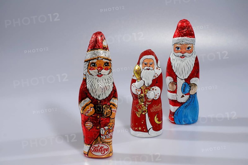 Three colourful chocolate Father Christmases, Hamburg, Hamburg, Federal Republic of Germany