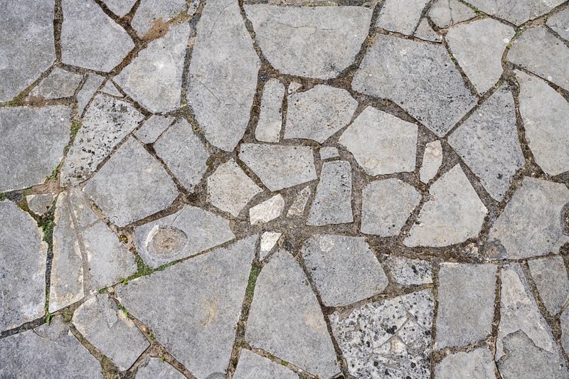 Mosaic of stone slabs on a garden terrace, full-size