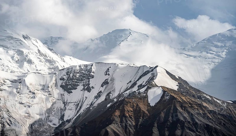 Dramatic mountain landscape, mountain valley, behind glaciated and snow-covered mountain peak Pik Lenin, Trans Alay Mountains, Pamir Mountains, Osh Province, Kyrgyzstan, Asia