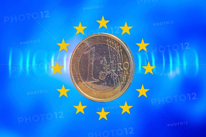 Symbolic image of the digital euro: one-euro coin against a virtual background
